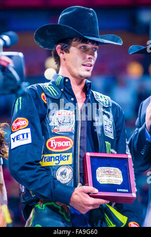 J.B. Mauney on stage after winning the PBR bull riding world finals in ...