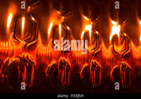 Abstract shining red decorative metal pattern, industrial photo background Stock Photo