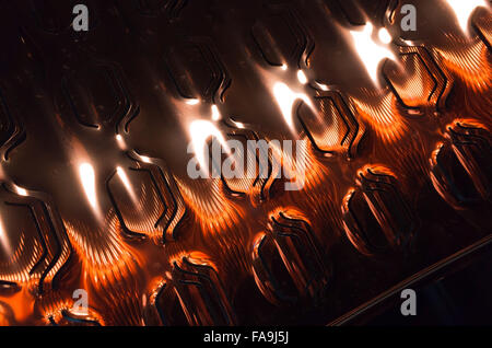 Abstract shining red metal pattern, industrial photo background Stock Photo
