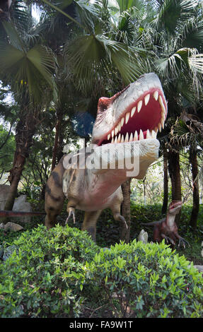 Tyrannosaurus rex - dinosaur in the forest Stock Photo