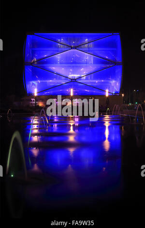 Water Mirror and Le Nuage building by night designed by Philippe Starck , Parvis Stephane Hessel, Montpellier, France Stock Photo