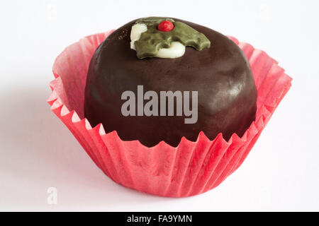 Christmas pudding chocolate truffle cake isolated on white background Stock Photo