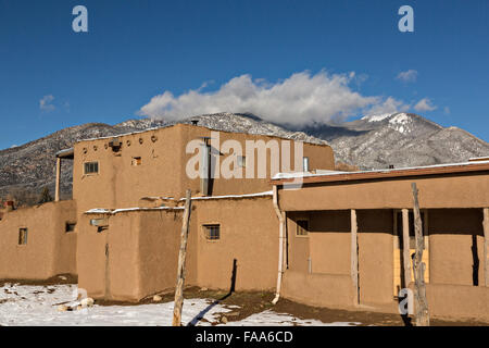 An old adobe home at the ancient Native American Taos Pueblo outside Taos, New Mexico. The pueblos are considered to be one of the oldest continuously inhabited communities in the United States and is designated a UNESCO World Heritage Site. Stock Photo