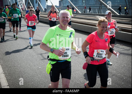 Rotterdam, The Netherlands. 04th Apr, 2015. Participants run on the Erasmus bridge during the Rotterdam Marathon. Credit:  Romy Arroyo Fernandez/Alamy Stock Photo