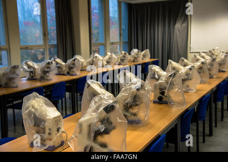 in plastic wrapped microscopes in college room at university in amsterdam Stock Photo