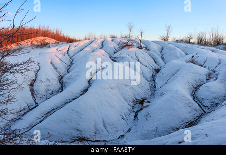 First light after a fresh snowfall at The Cheltenham Badlands. Caledon, Peel, Region, Ontario, Canada. Stock Photo