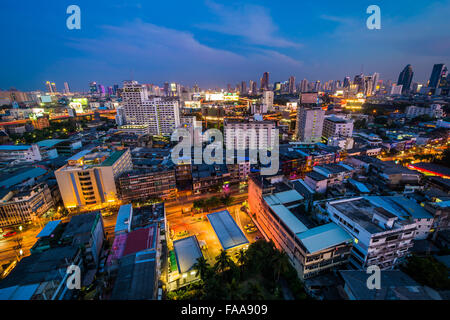 View of the Ratchathewi District at twilight, in Bangkok, Thailand. Stock Photo