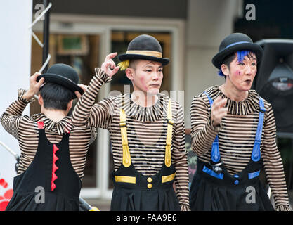 Clown jugglers at a street festival in Bangkok, Thailand Stock Photo