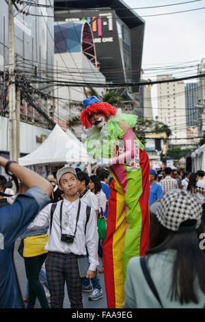 Stilt artist at a street festival in Bangkok, Thailand Stock Photo