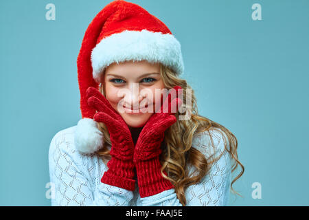 portrait of girl dressed in santa hat Stock Photo