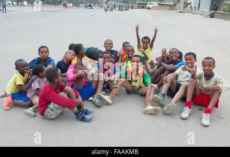 ETHIOPIA, ADDIS ABABA-DECEMBER 12,2013.  Children play soccer on the main street of Addis Ababa, Churchill Street December 12, 2 Stock Photo