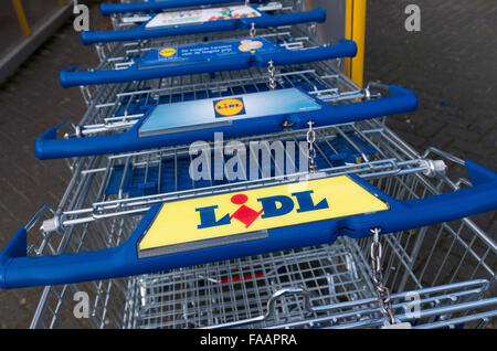 ZWOLLE, NETHERLANDS - MARCH 22, 2015: Lidl shopping carts. The company is active in a large part  of Europe, with around 8000 st Stock Photo