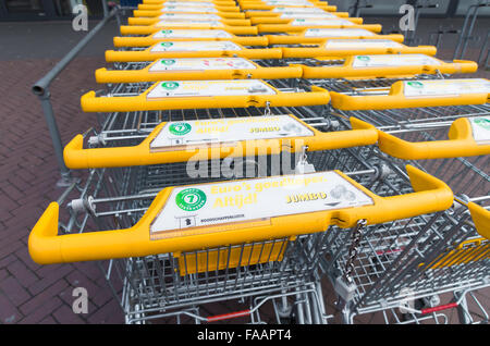 ZWOLLE, NETHERLANDS - MARCH 22, 2015: Yellow Jumbo shopping carts. Jumbo employs about 30,000 people. Stock Photo