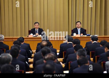 Beijing, China. 25th Dec, 2015. Chinese Vice Premier Wang Yang (L, back) speaks at the central rural work conference in Beijing, capital of China. The conference was held from Dec. 24 to 25. Chinese State Councilor Yang Jing (R, back) presided over the meeting. © Rao Aimin/Xinhua/Alamy Live News Stock Photo