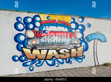 ZWOLLE, NETHERLANDS - MARCH 22, 2015: Colorful graffiti advertisement at the entrance of a car wash station Stock Photo