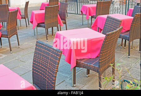chairs and tables in a Venice square Stock Photo