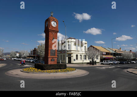 The red brick four sided clock tower commemorates the 50th Anniversary for the end of World War II Mudgee NSW Australia Stock Photo