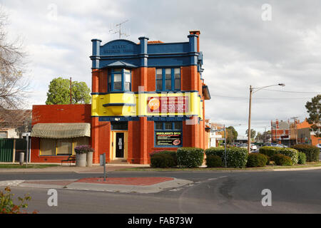 Former State Bank of Victoria building with a striking paint scheme Kerang Victoria Australia Stock Photo