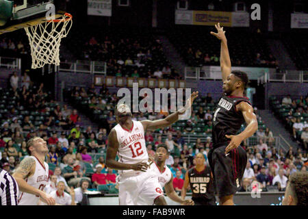 Honolulu, Hawaii, USA.  25th December, 2015. Harvard Crimson center Zena Edosomwan (4) shoots the ball during the action between the Harvard Crimson and the Oklahoma Sooners at the 2015 Diamond Head Classic at Stan Sheriff Center in Honolulu, HI. Credit:  Cal Sport Media/Alamy Live News Stock Photo