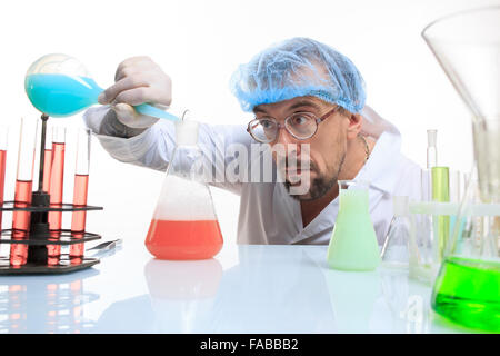 Mad chemist in the lab doing reaction Stock Photo