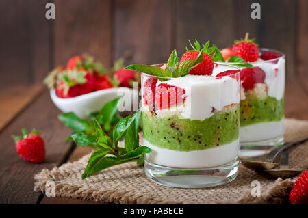Creamy dessert with strawberries and kiwi Stock Photo