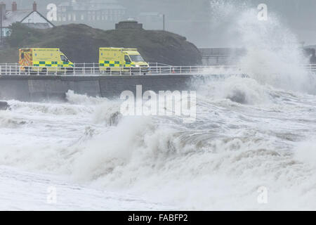 Aberystwyth, Wales, UK. 26th December 2015 Huge waves batter the sea defence walls at Aberystwyth as the bad weather continues on Boxing Day with a Red take action warning for Lancashire this morning. Credit:  Ian Jones/Alamy Live News Stock Photo