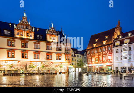 Stadthaus building and half-timbered house on the market square at dusk, Coburg, Upper Franconia, Bavaria, Germany Stock Photo