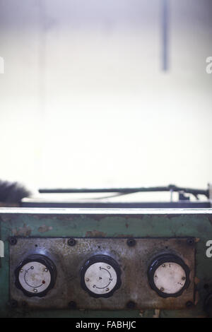 Color image of some buttons on a dirty old control panel. Stock Photo