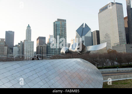 BP Pedestrian Bridge linking Maggie Daley Park with Millennium Park in Chicago, Illinois, USA with city skyline in the background Stock Photo