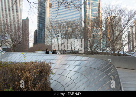 BP Pedestrian Bridge linking Maggie Daley Park with Millennium Park in Chicago, Illinois, USA with city skyline in the background Stock Photo