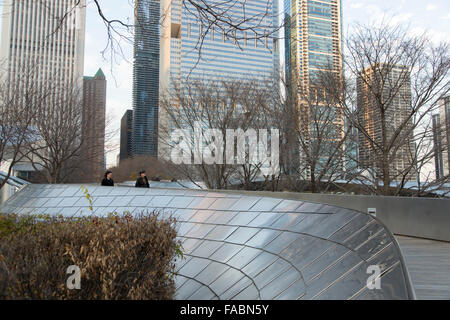 BP Pedestrian Bridge linking Maggie Daley Park with Millennium Park in Chicago, Illinois, USA with city skyline in the background Stock Photo