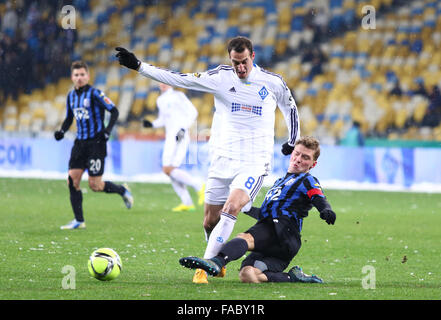 KYIV, UKRAINE - NOVEMBER 29, 2015: Radosav Petrovic of Dynamo Kyiv (L) fights for a ball with Artem Filimonov of FC Chornomorets Odesa during their Ukrainian Premier League game Stock Photo