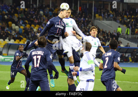 KYIV, UKRAINE - NOVEMBER 21, 2012: Zlatan Ibrahimovic of FC Paris Saint-Germain (L) fights for a ball with Yevhen Khacheridi of Stock Photo