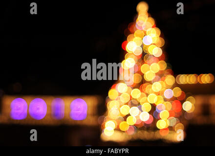 Colourful bokeh lights of New Year's tree Stock Photo