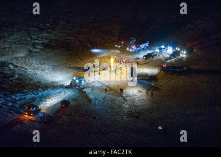 The Soyuz TMA-17M landing site with the International Space Station Expedition 45 crew moments after landing in a remote area in the  spacecraft December 11, 2015 near Zhezkazgan, Kazakhstan. The crew is returning after 141 days onboard the International Space Station. Stock Photo