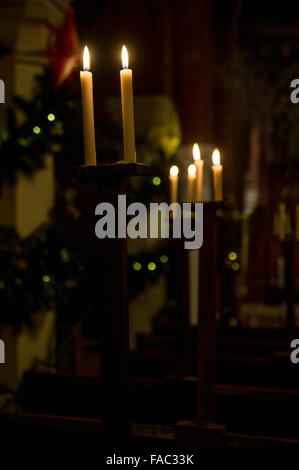 Candles in church at Christmas time Stock Photo