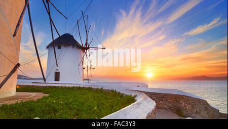 Windmills in sunrise, Mykonos Island, Greece Stock Photo