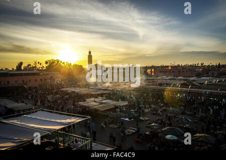 Sunset over  Jemaa el-Fnaa square and Koutoubia Mosque in Marrakesh Stock Photo