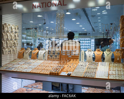 Window display of gold necklace and ornaments in Dubai gold souk, United Arab Emirates (UAE). Stock Photo