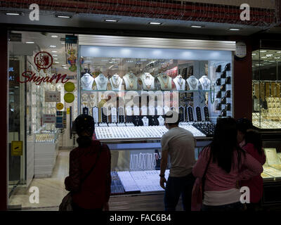 Tourists and residents window shopping at Dubai Gold Souk (Market), United Arab Emirates (UAE). Stock Photo