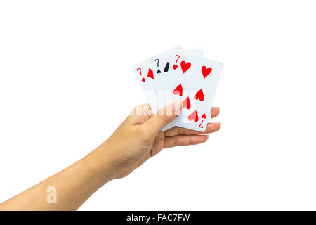 Playing cards in hand isolated on white background Stock Photo