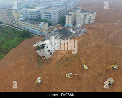 Beijing, China's Guangdong Province. 21st Dec, 2015. Rescuers work at the landslide site of an industrial park in Shenzhen, south China's Guangdong Province, Dec. 21, 2015. © Zheng Lei/Xinhua/Alamy Live News Stock Photo