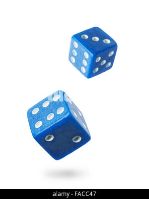 Two blue gambling dices falling down isolated on white .Local focus Stock Photo