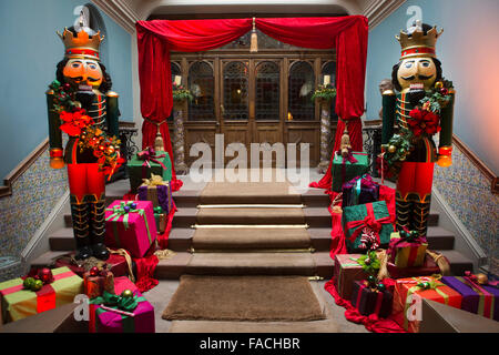 UK, England, Cheshire, Knutsford, Tatton Hall, Nutcracker themed Christmas decorations in Family Entrance Stock Photo