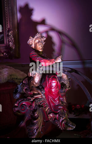 UK, England, Cheshire, Knutsford, Tatton Hall, Entrance Hall, Nutcracker Xmas decorations, Victorian sleigh Stock Photo