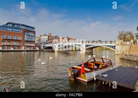 A well varnished motor boat moored on the River Thames at Windsor, Berkshire, England, UK Stock Photo