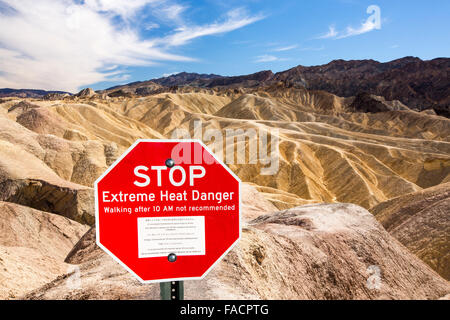 Badland scenery at Zabriskie Point in Death Valley which is the lowest, hottest, driest place in the USA, with an average annual Stock Photo