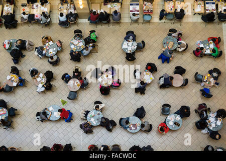 Shoppers pack the food court in the Queens Center Mall in the borough of Queens in New York on the so-called Super Saturday, December 19, 2015. Restaurant and food service sales are expected to increase as shoppers add dining to their shopping expeditions.  (© Richard B. Levine) Stock Photo