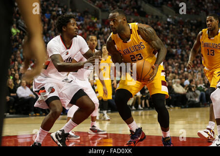 Portland, Oregon, USA. 26th December, 2015. LEBRON JAMES (23) looks to ...