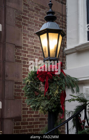 Lamppost decorated for the Holiday Season, NYC Stock Photo